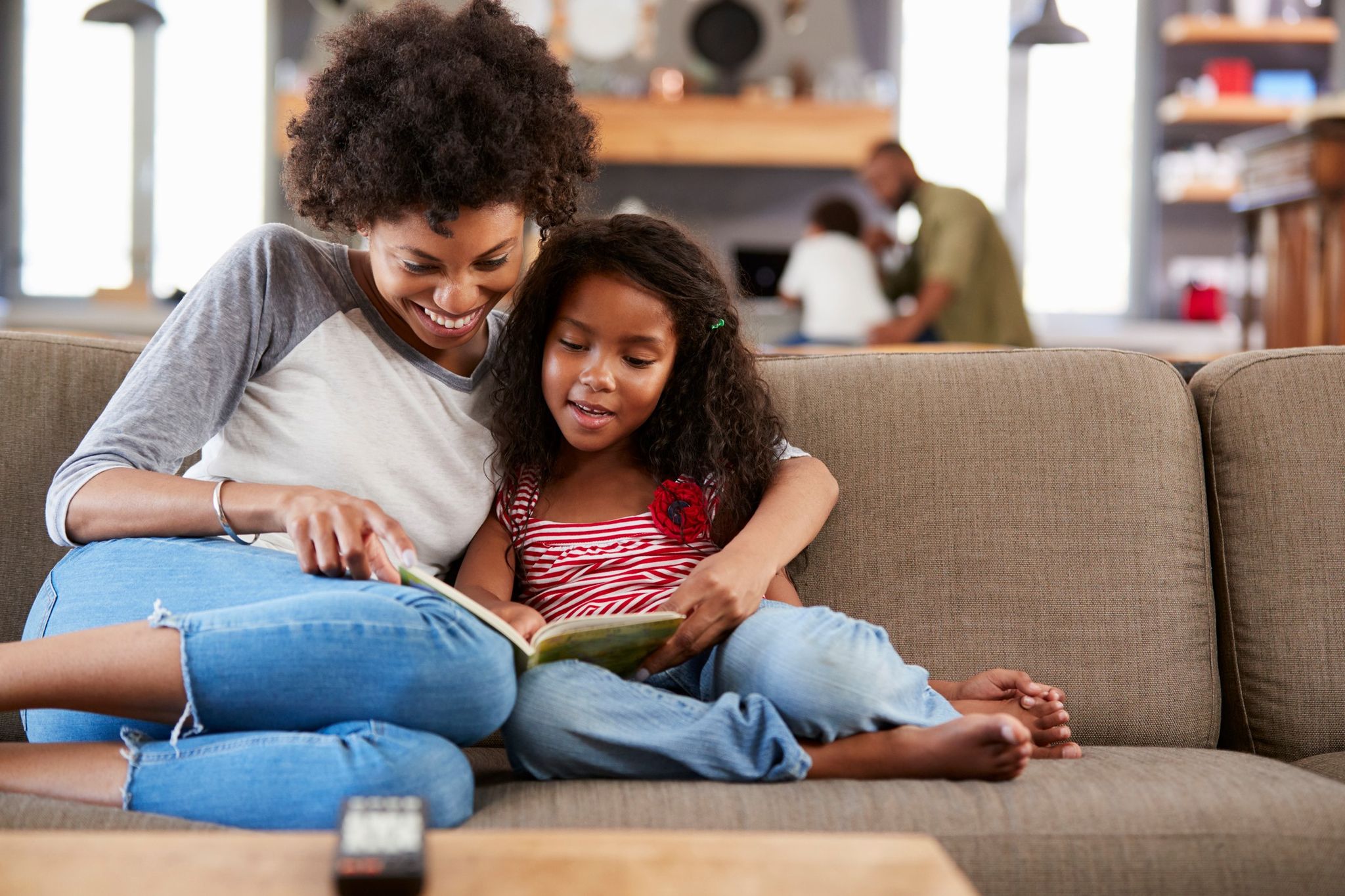 Mom reading with daughter