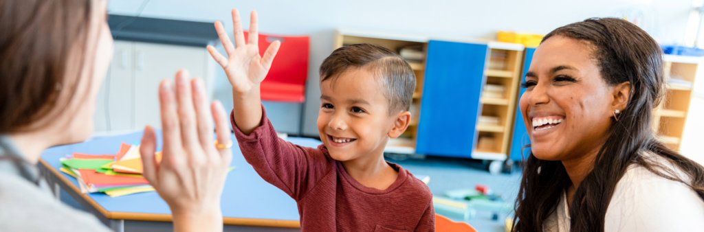 Parents, teachers, and students interacting as part of the strategic planning process