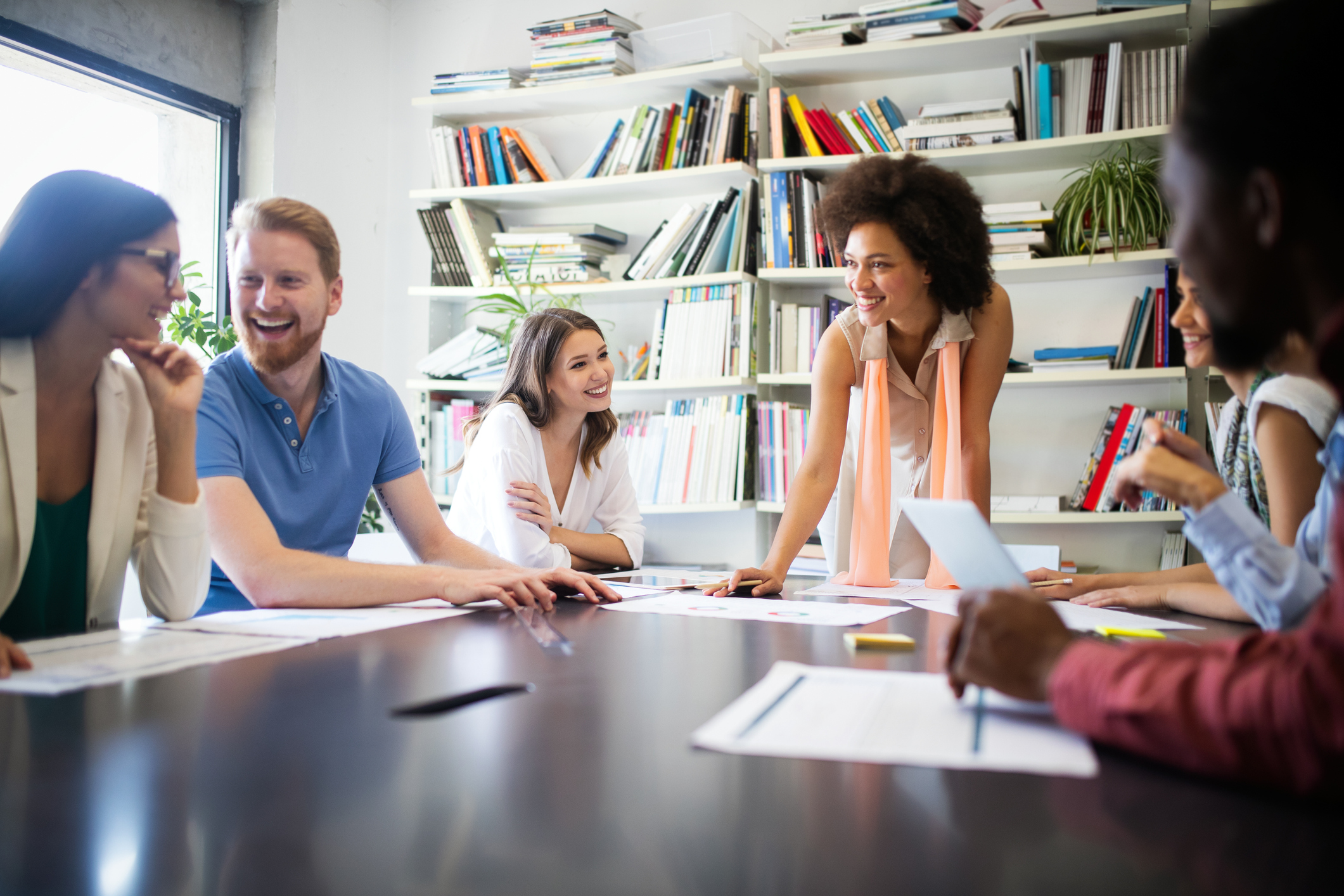 Creative business people working on business project in modern office